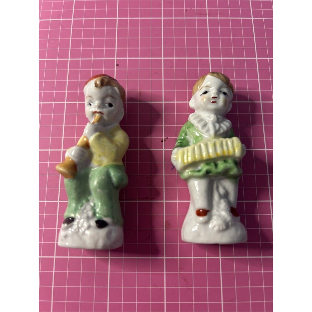 set of two vintage porcelain figurines, likely from the mid-20th century